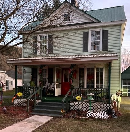 The residence at 2 Poplar Avenue in the Town of Hartwick, Oswego County, where the home invasion and assault occurred on Monday, January 3, 2022.
